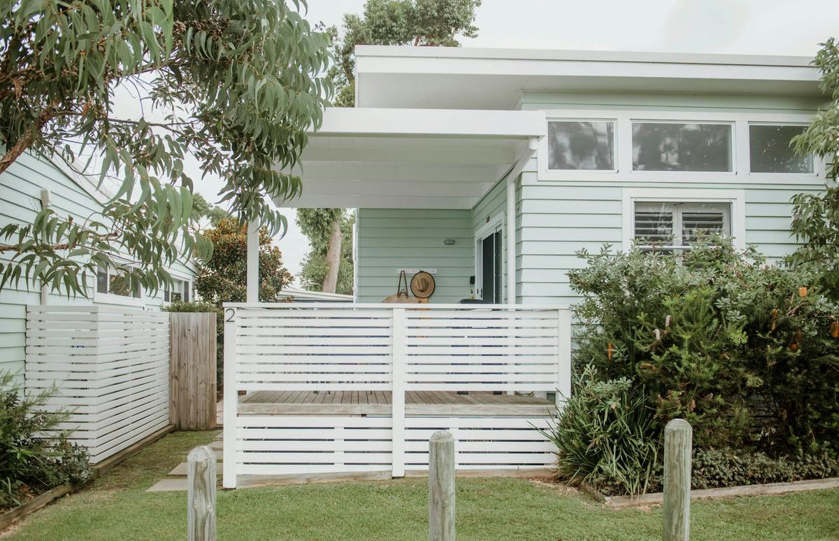 Surfside Cabin (sleeps 4) exterior with covered deck and private courtyard