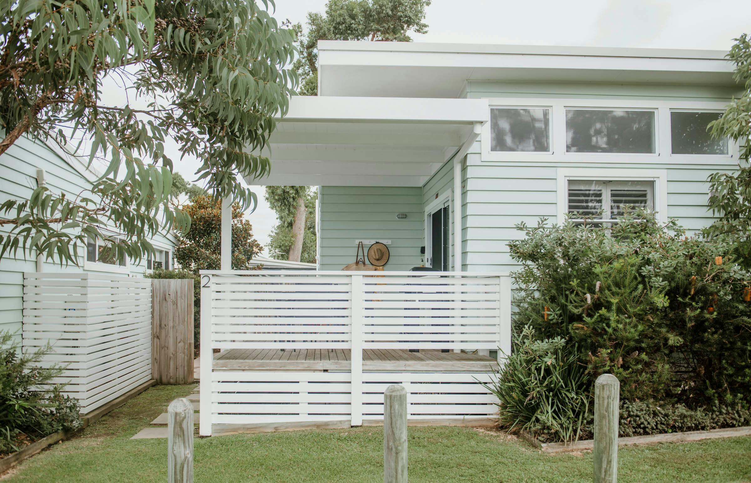 Surfside Cabin (sleeps 4) exterior with covered deck and private courtyard