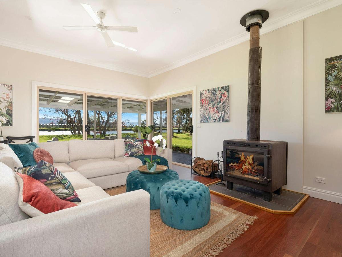 Lounge room with wood fireplace