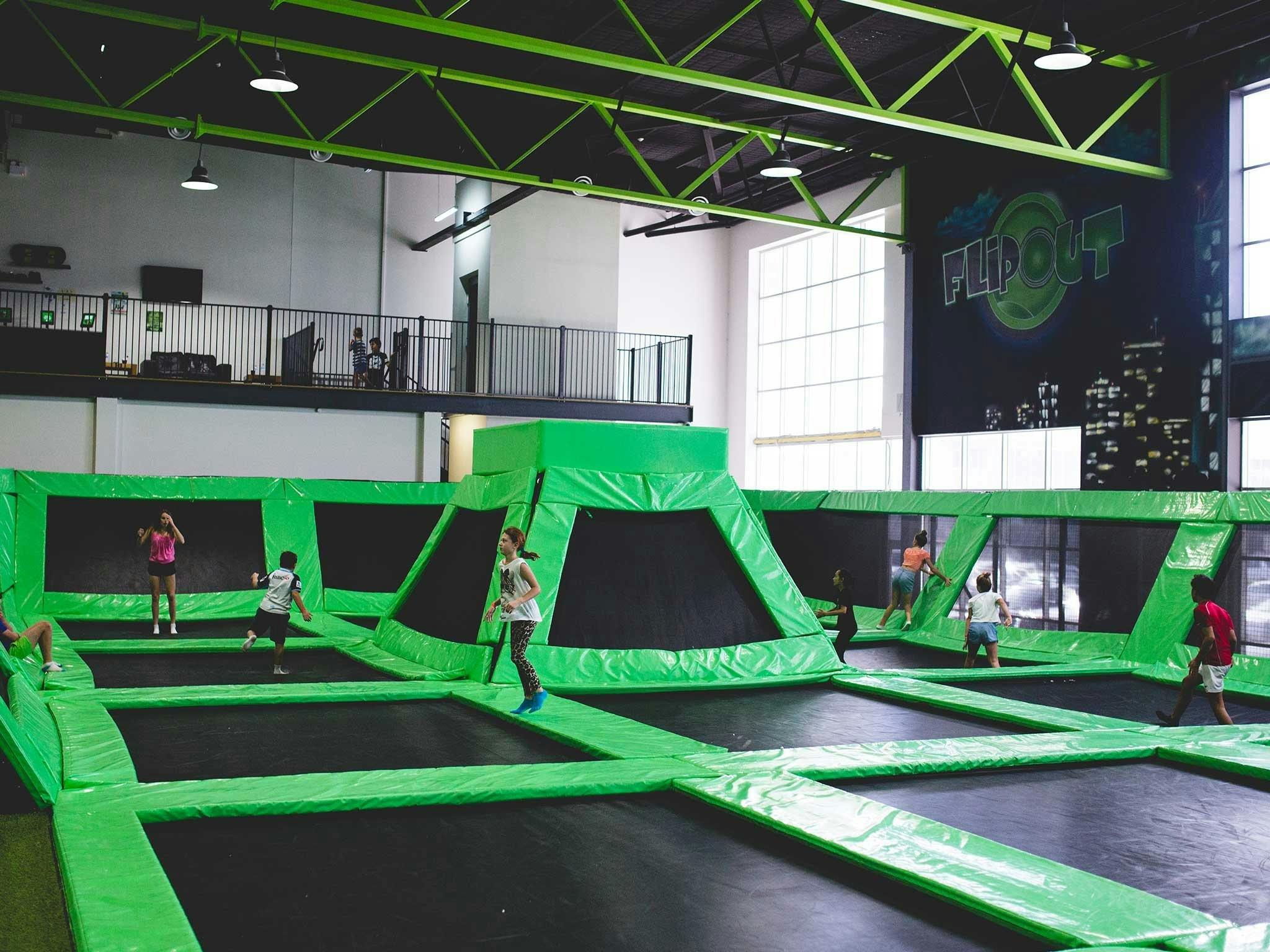Kids jumping on trampolines