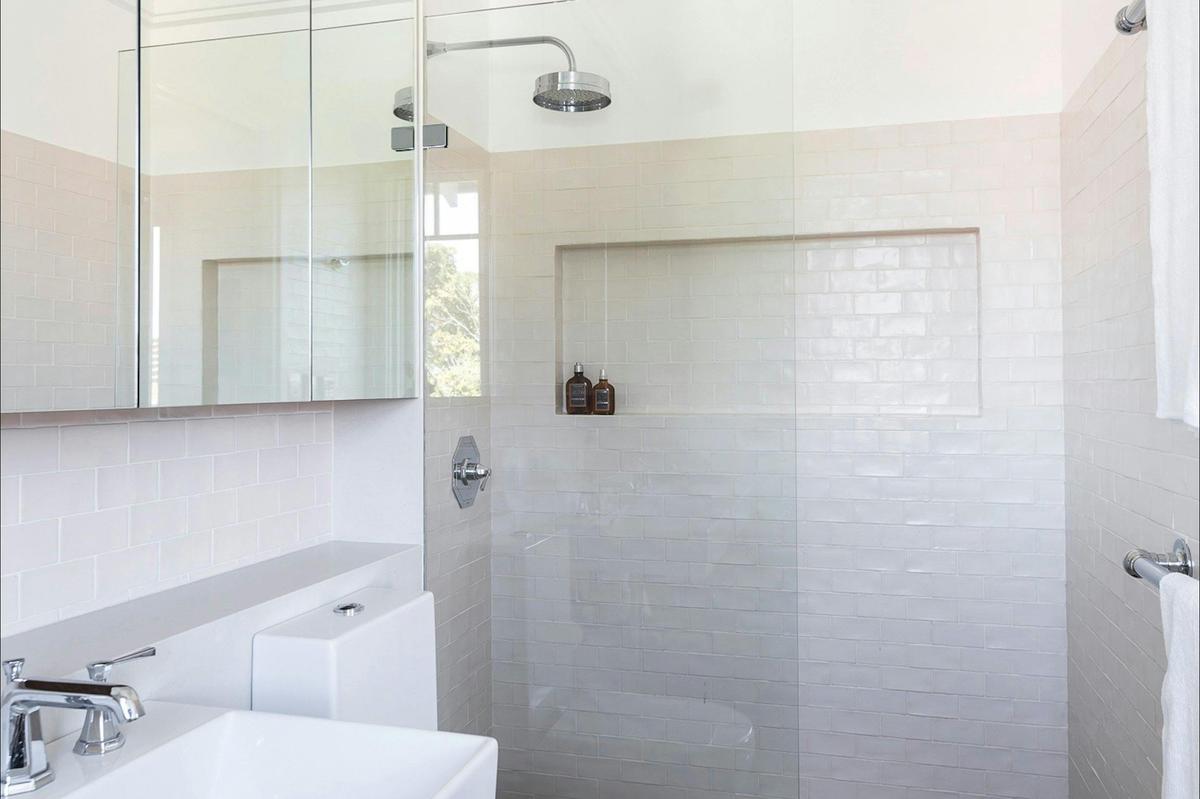 You'll love the perfectly designed bathroom with rain shower