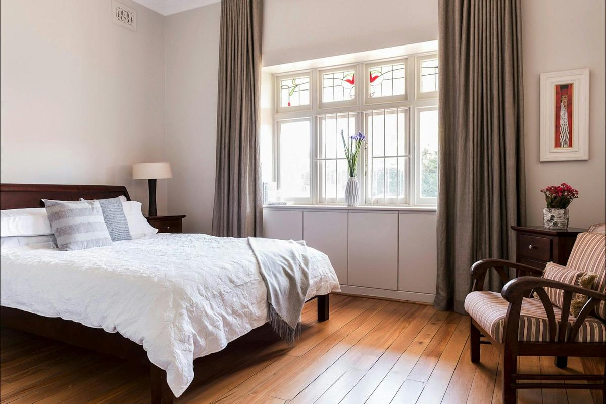 You'll love the light filled guest bedroom with Queen bed