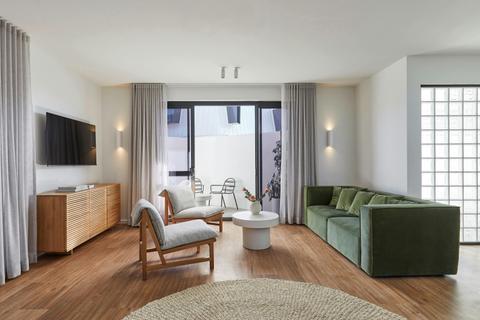 The Riverland Residence