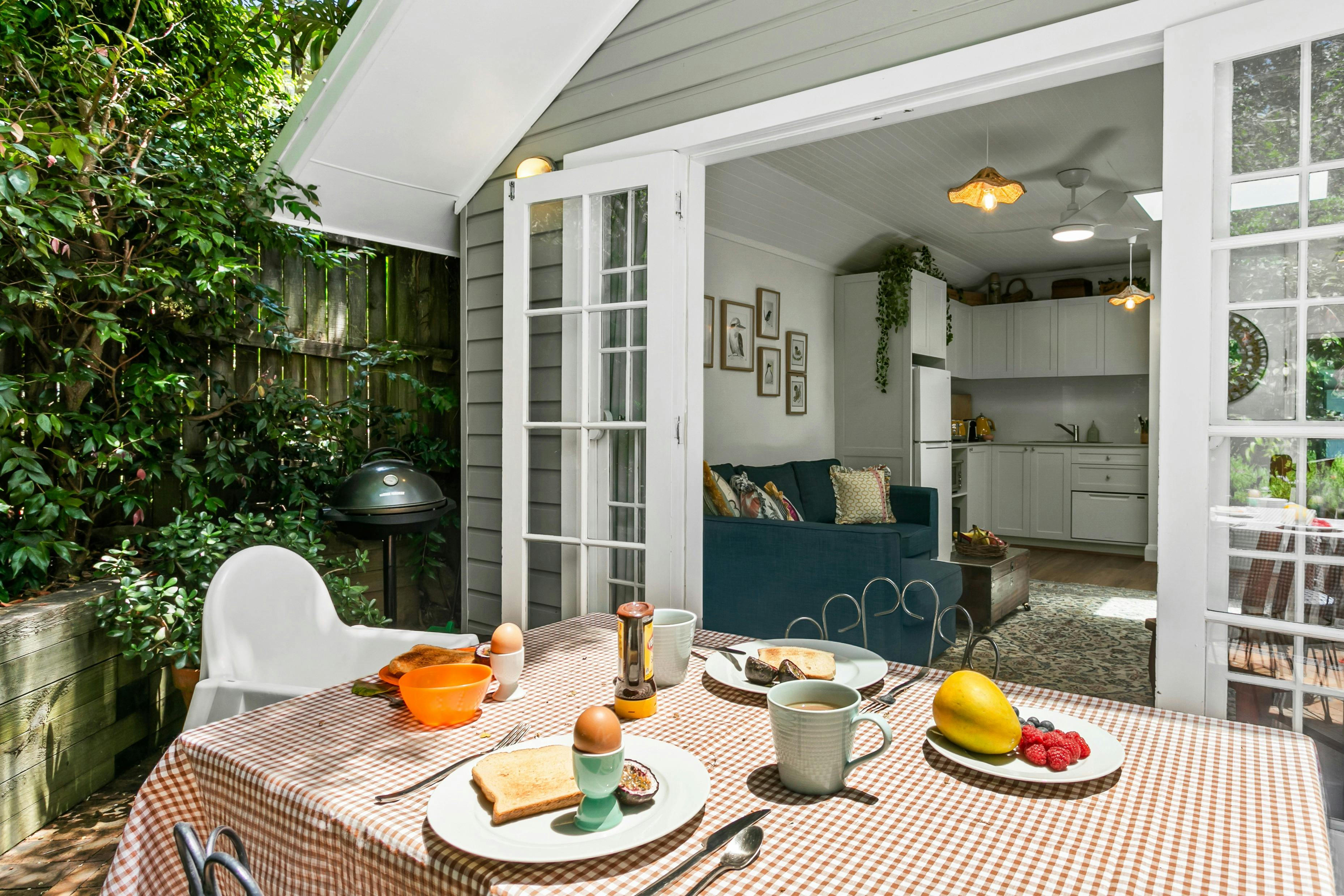 Outdoor courtyard, with electric bbq in summer, seating for four