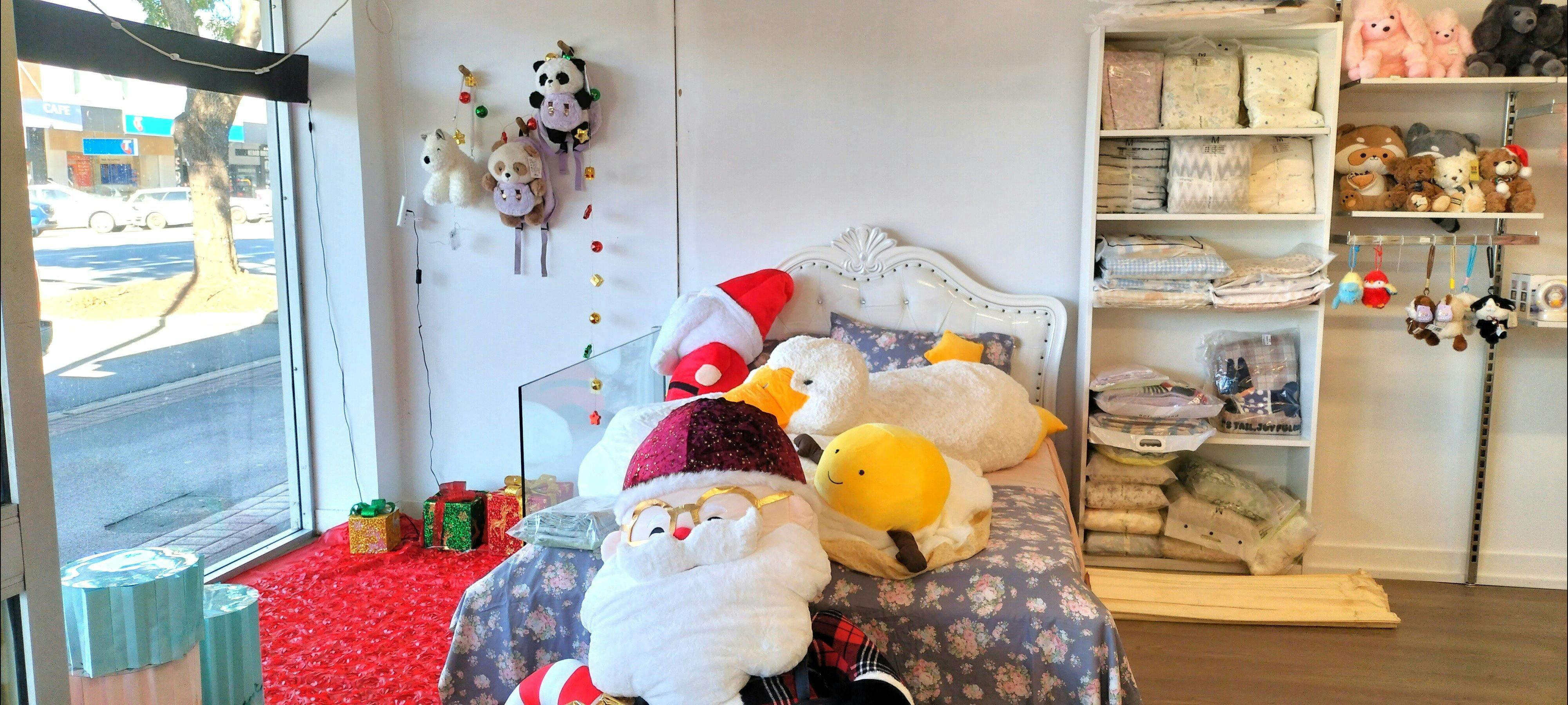Bedding section at front of dual shop with huge plushies for sale too.