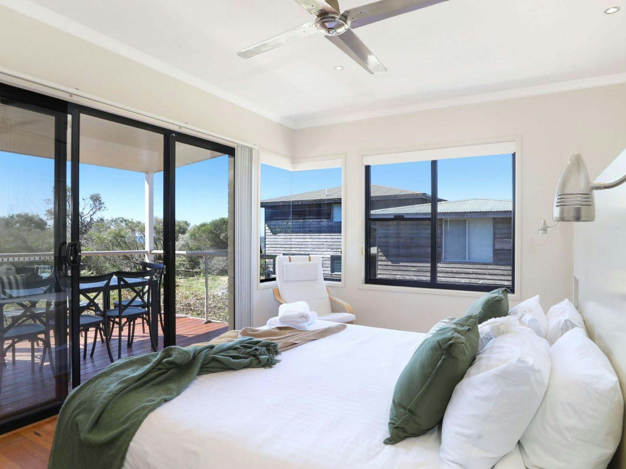 The Break | Bedroom 1 | King | Ceiling fan | Balcony access | Views