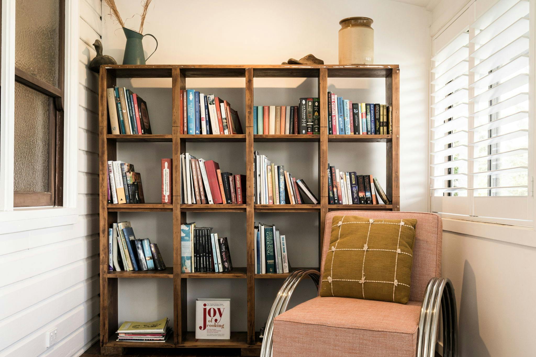 Reading room with a selection of books and comfortable reading chairs