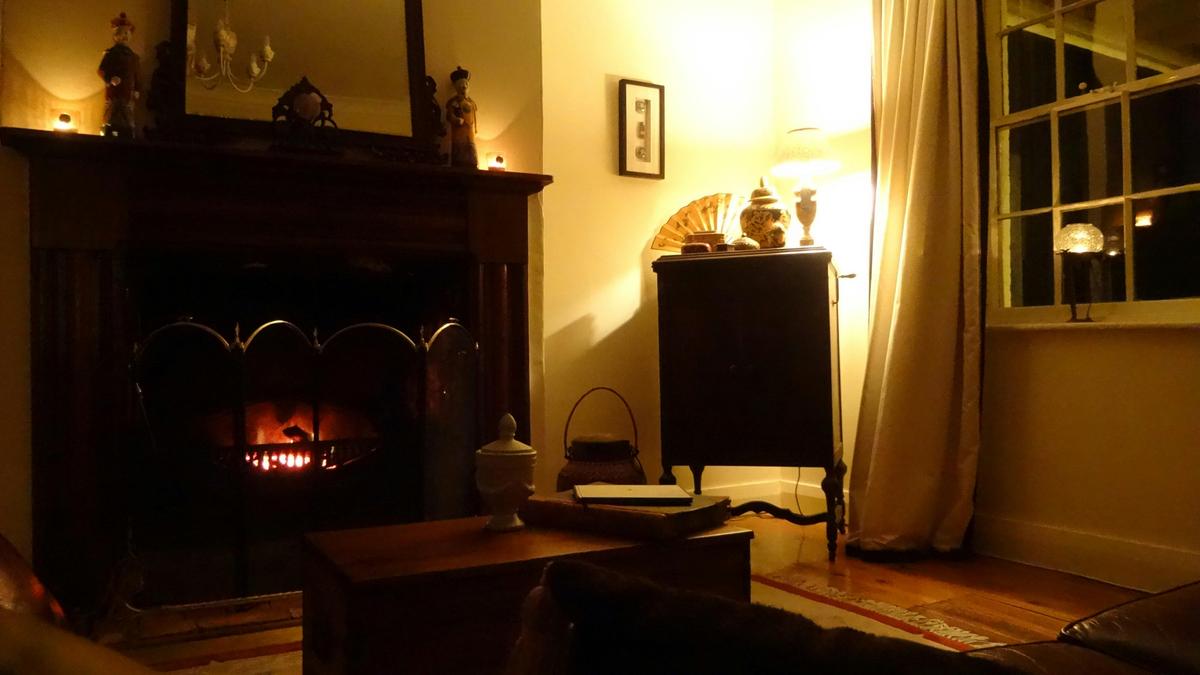 Cosy fireside in the guest lounge in winter