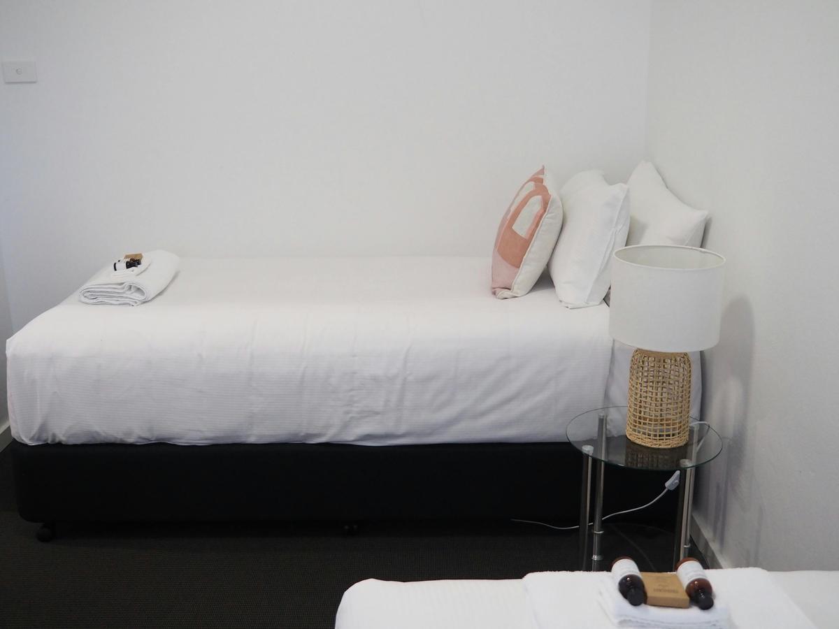 Bedroom 2 with Single and Queen/Twin Singles