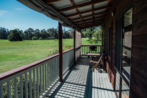 Relax on the balcony overlooking grazing animals and the great divide.
