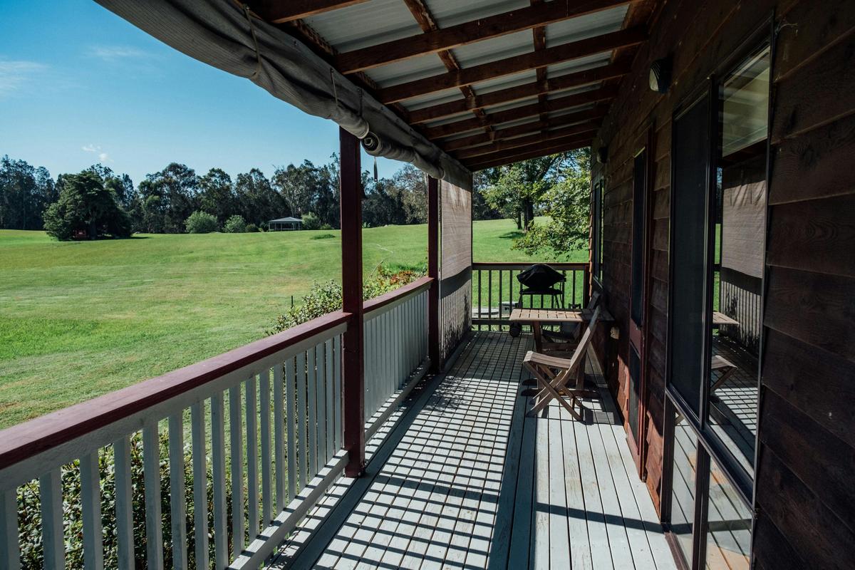 Relax on the balcony overlooking grazing animals and the great divide.