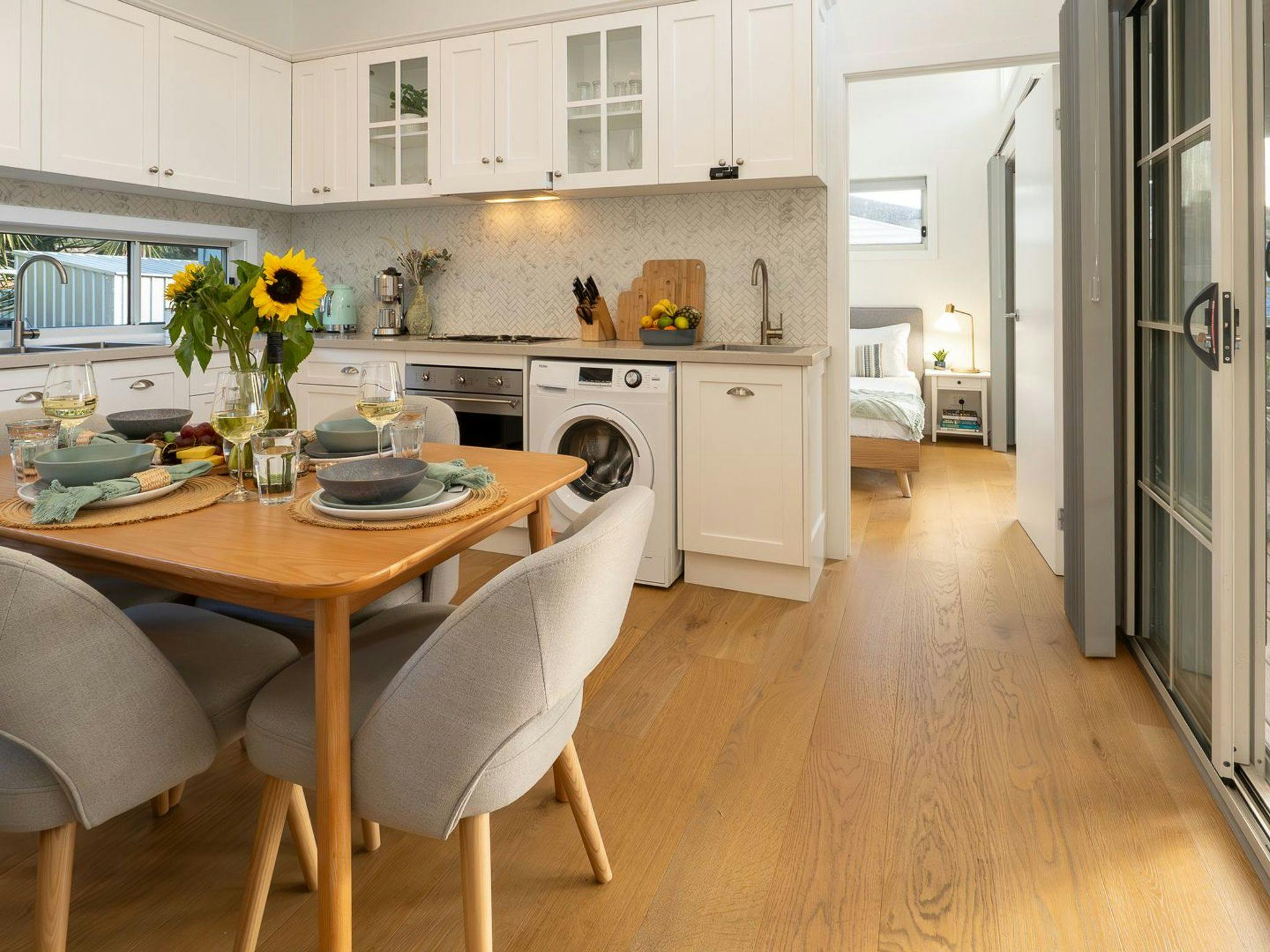 Sunshine Cottage | Dining | Open plan living | Washing machine