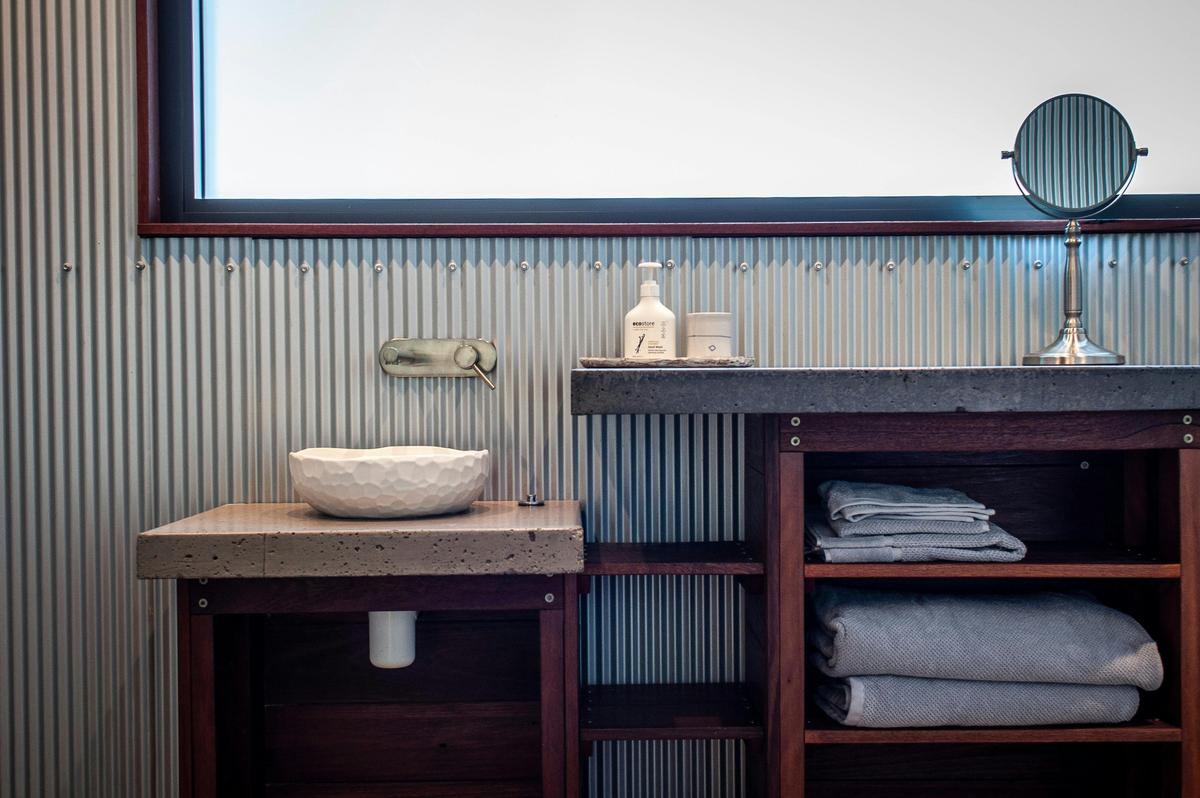 Bathroom has unique, stylish design.