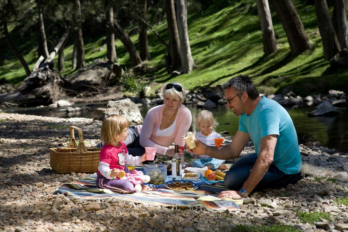 A picnic by the river makes for a relaxing and magical afternoon