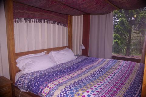 Balinese king bed