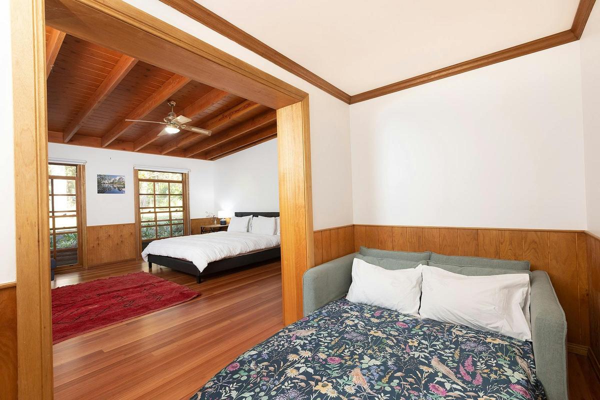 King Size bedroom with second bed in adjacent room