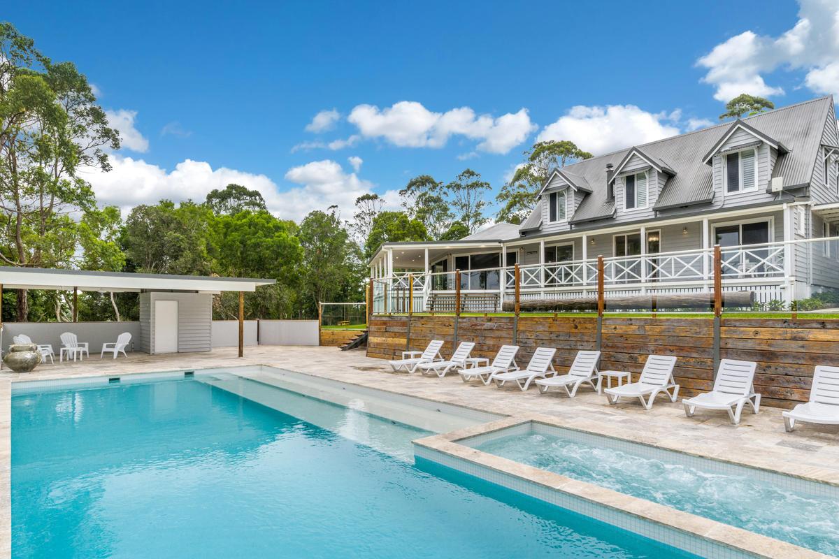 View of pool and lounging area
