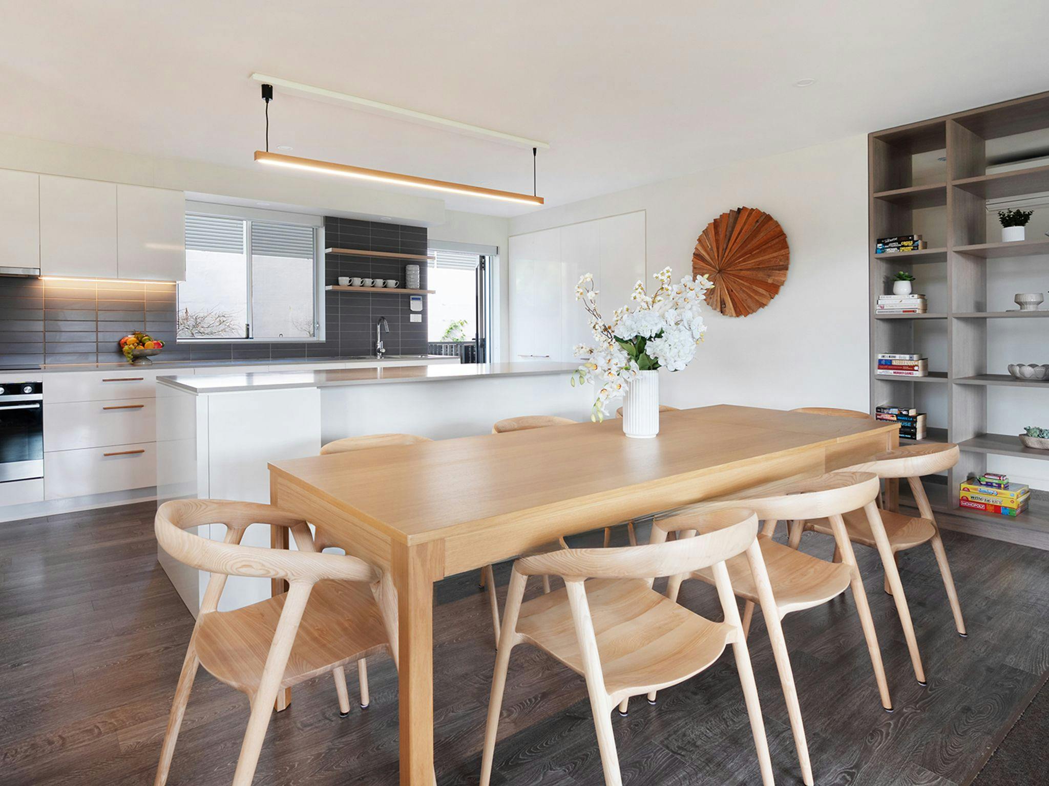 Surf N Turf | Upstairs chefs kitchen | Open plan dining area | Games and books