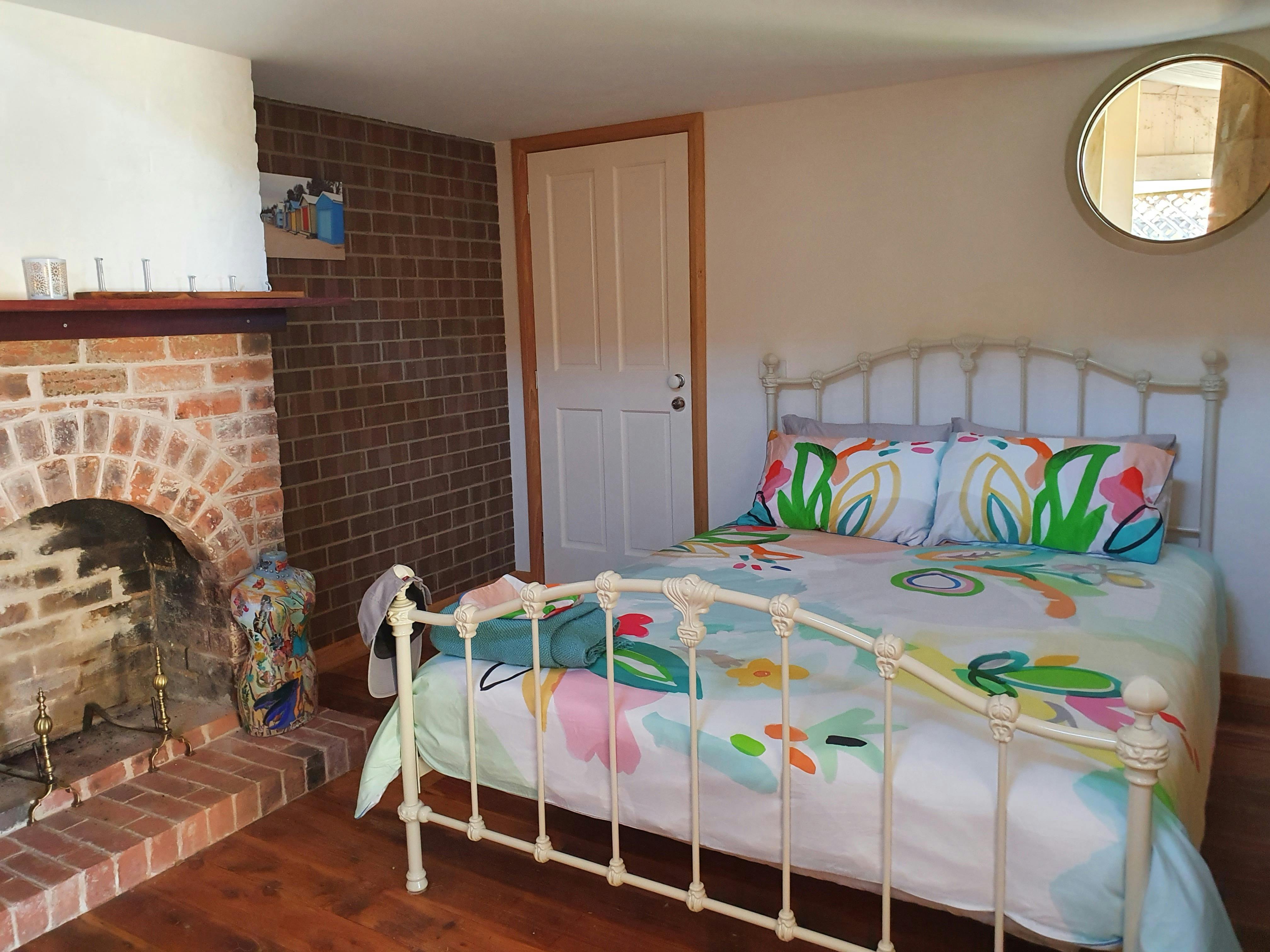 Downstairs bedroom with queen bed