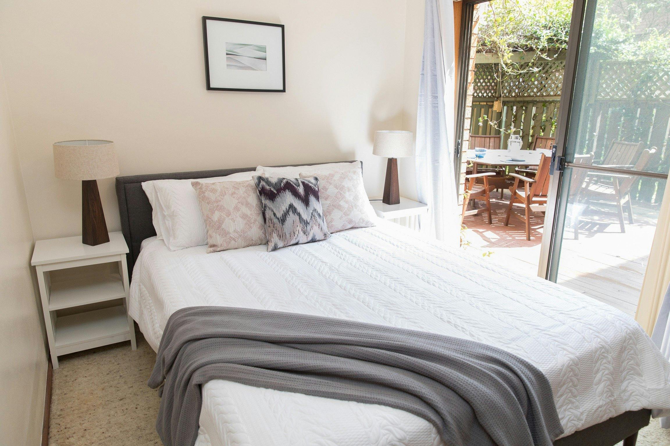 Taranaki Beach House |opposite Town Beach - 2nd Bedroom opening out onto courtyard