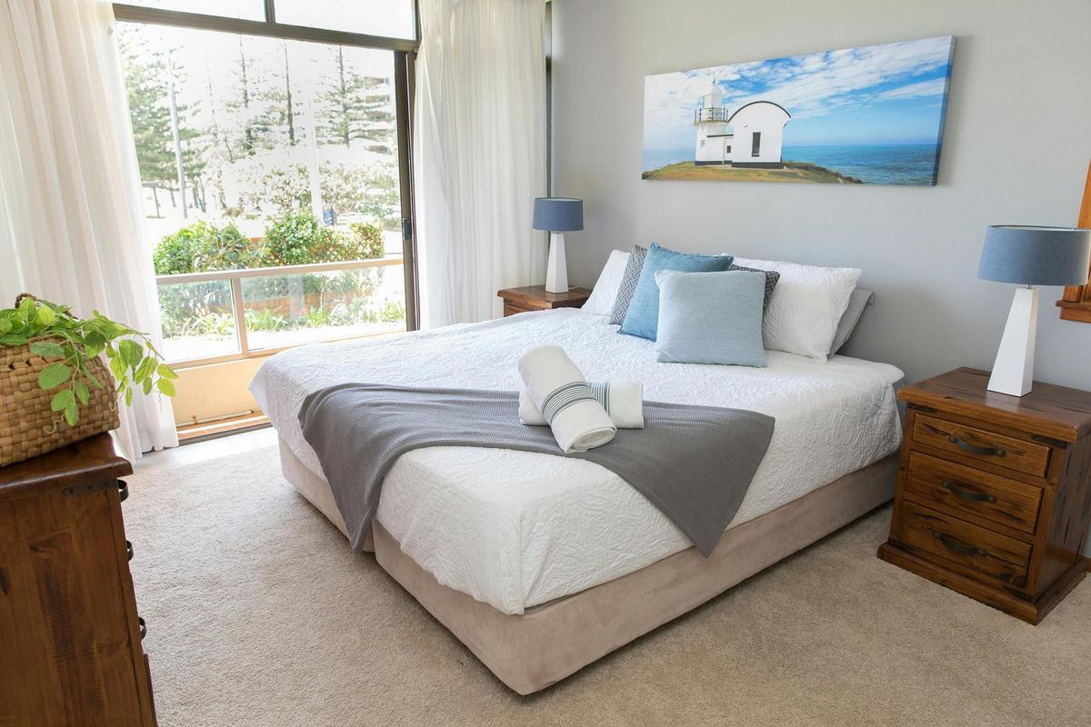 Taranaki Beach House | Opposite Town Beach - Master Bedroom with Ensuite