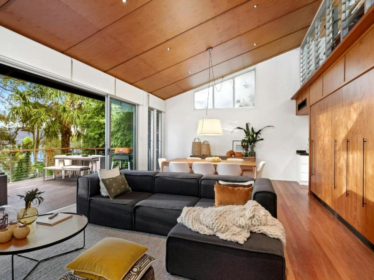 Living area with inviting pool views, creating a tranquil and relaxing atmosphere