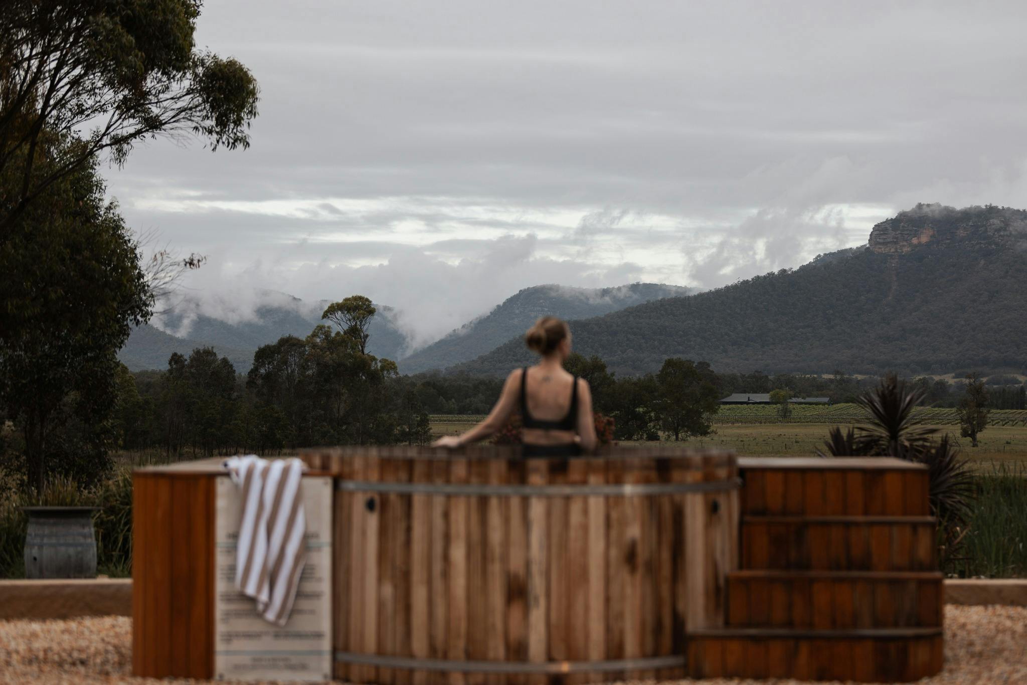 Hot tub with panoramic mountain views at The Wellness Farm Broke, Hunter Valley