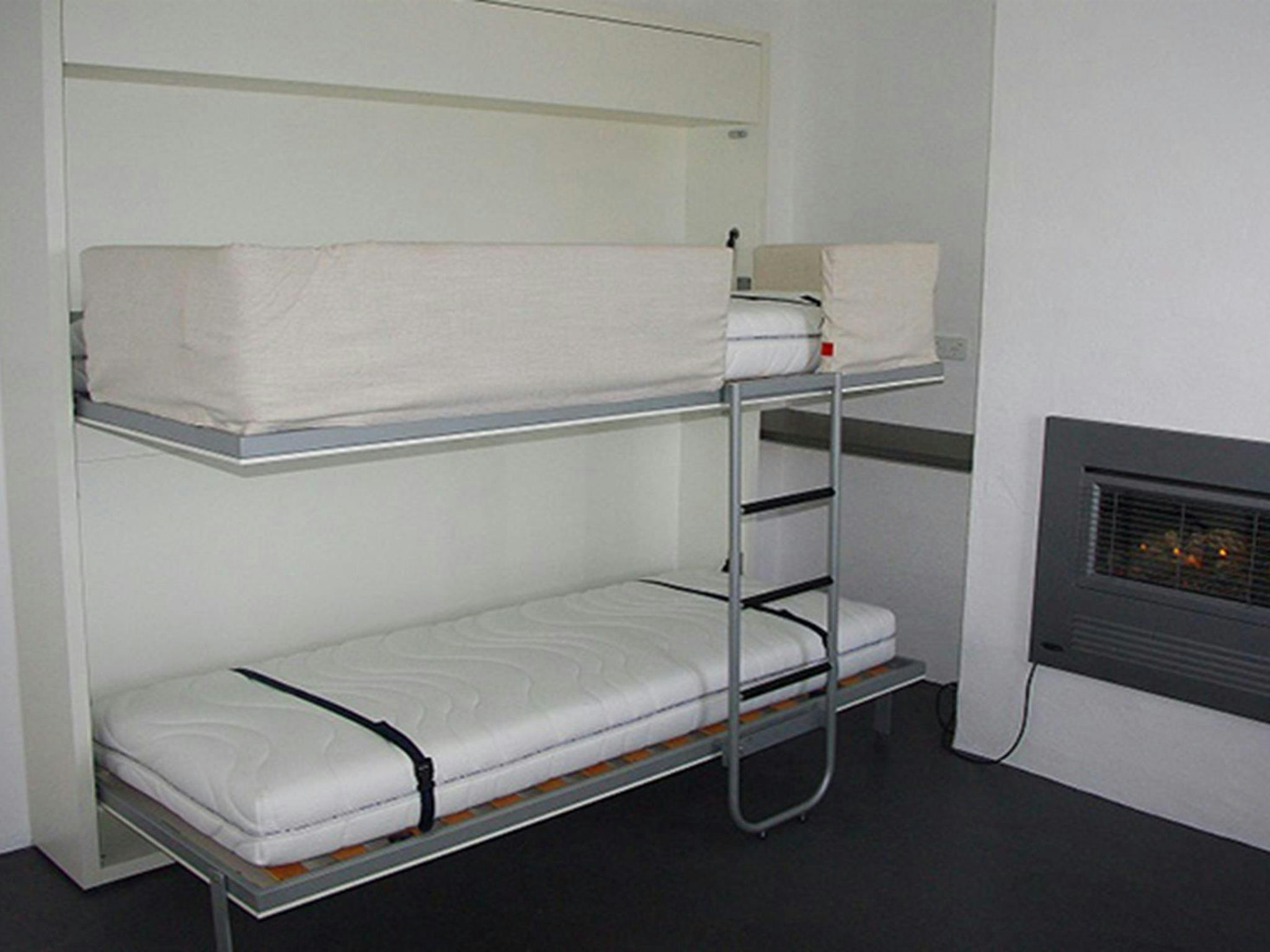 Bunk beds in the kitchen area of Telegraph Station bunkhouse in Beowa National Park. Photo: Gary