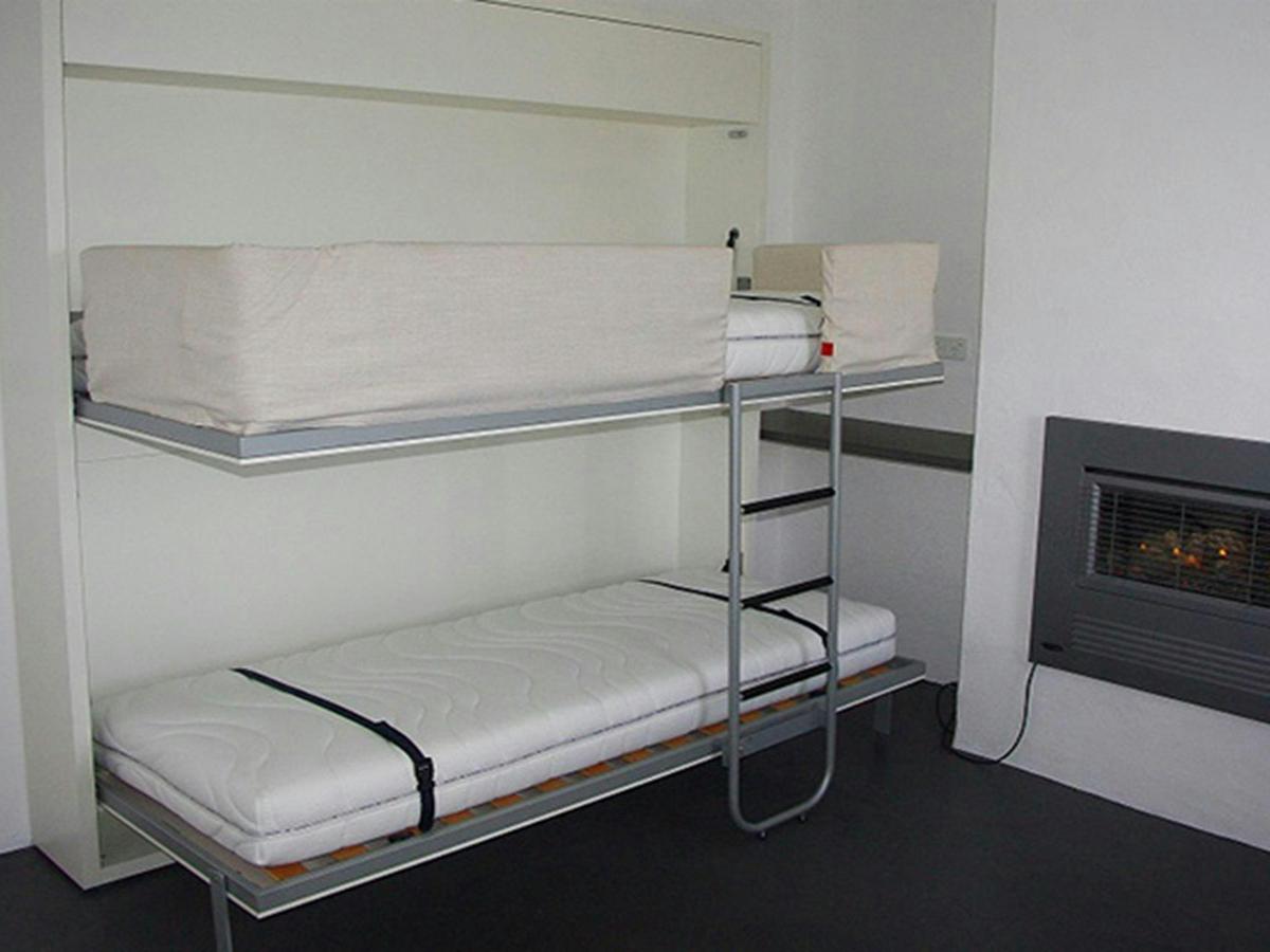 Bunk beds in the kitchen area of Telegraph Station bunkhouse in Beowa National Park. Photo: Gary