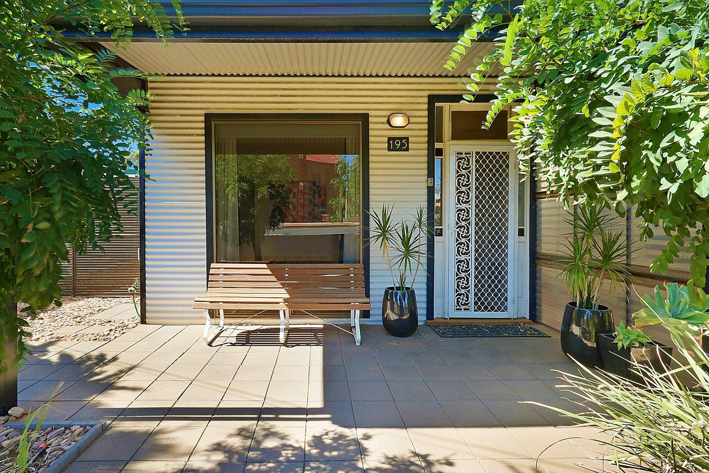 Generously shaded front of the house, ensures privacy and a leafy outlook