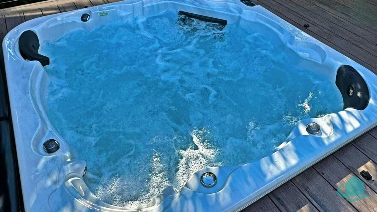 Spa situated in backyard deck