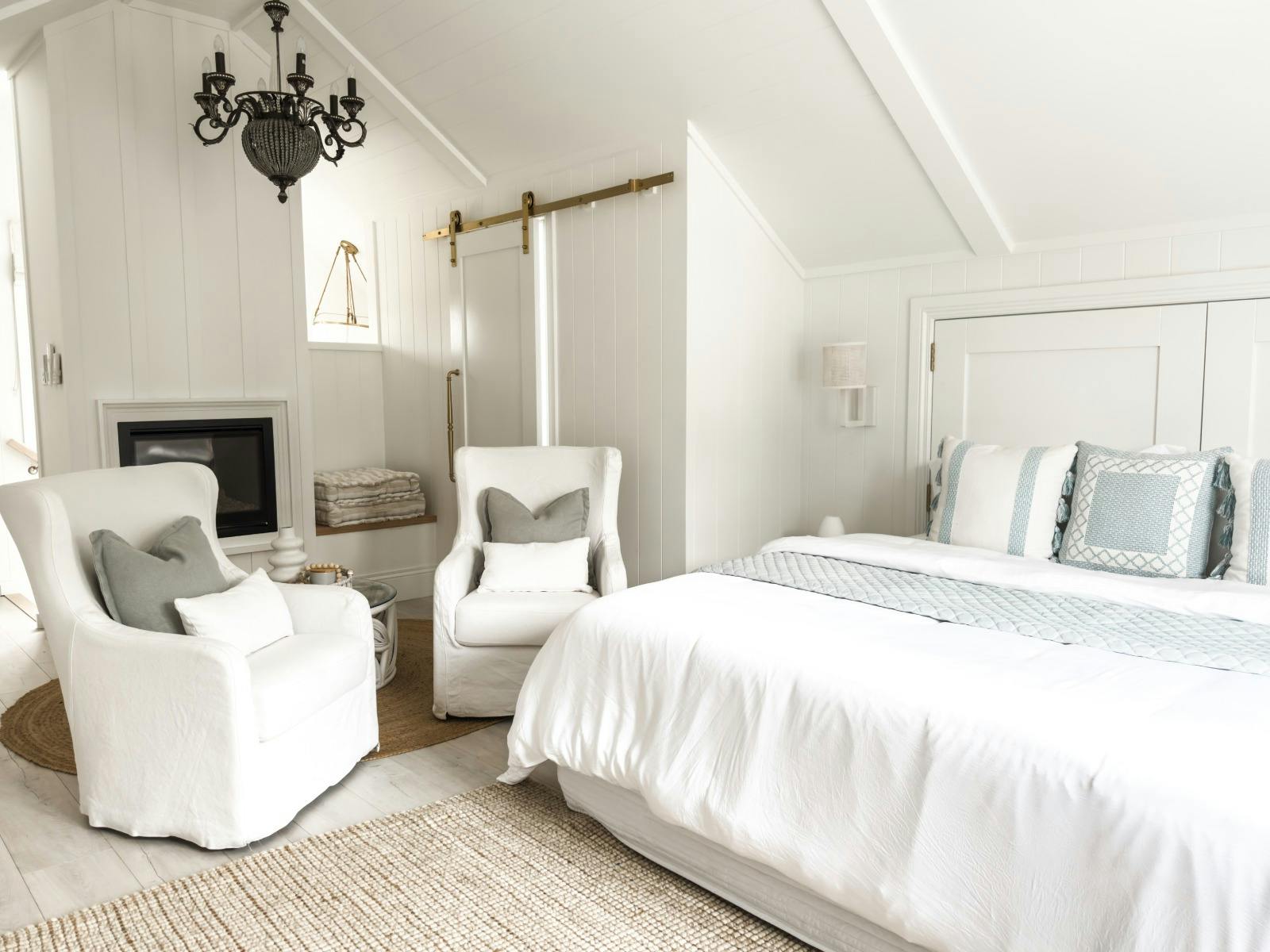The Barn at Farmstead - Loft Bedroom and seating area