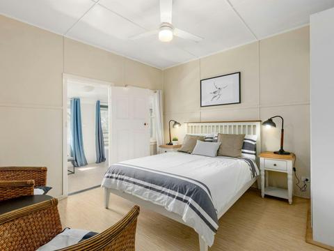 Interior of Tuckers Rocks Cottage master bedroom. Photo: Mitchell Franzi/DPIE
