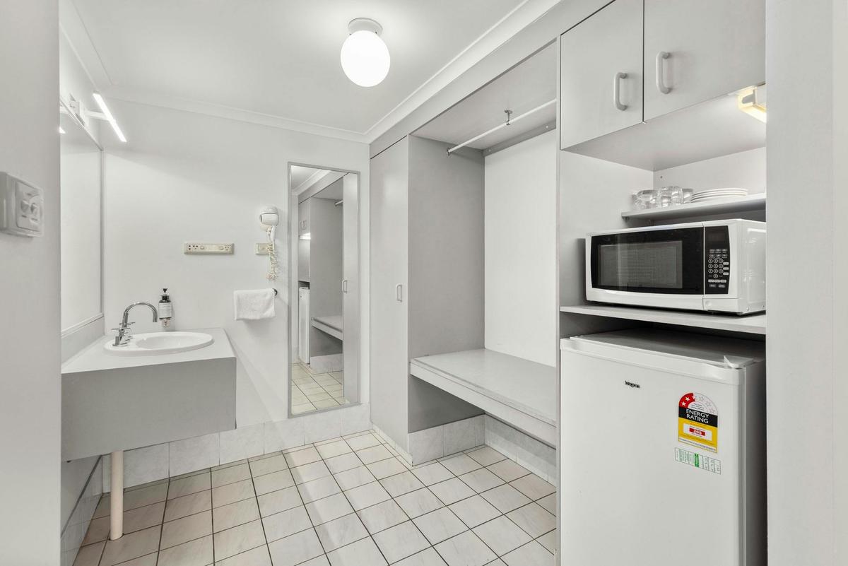 Standard Family Room vanity, microwave and fridge
