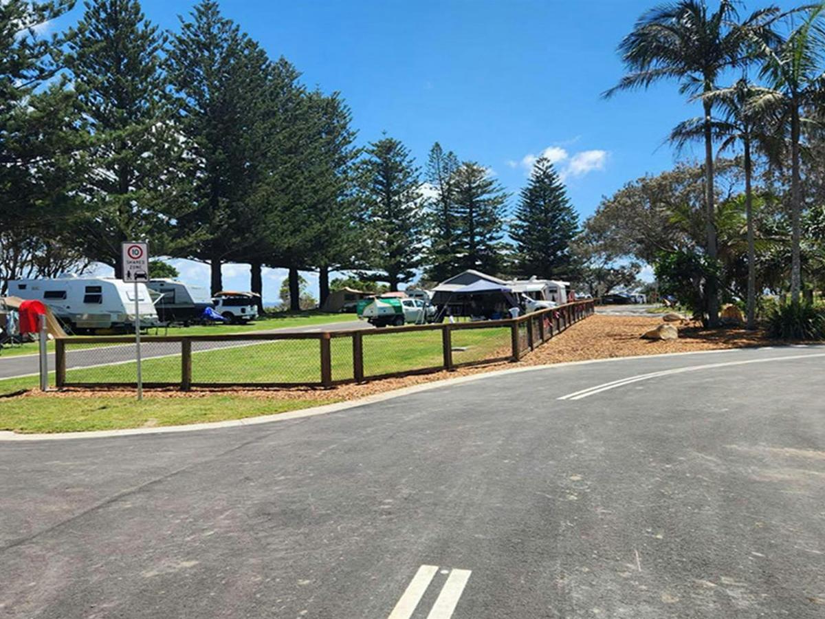 View of campsites and the access road at Trial Bay Gaol campground. Credit: Brandan Argent &copy;