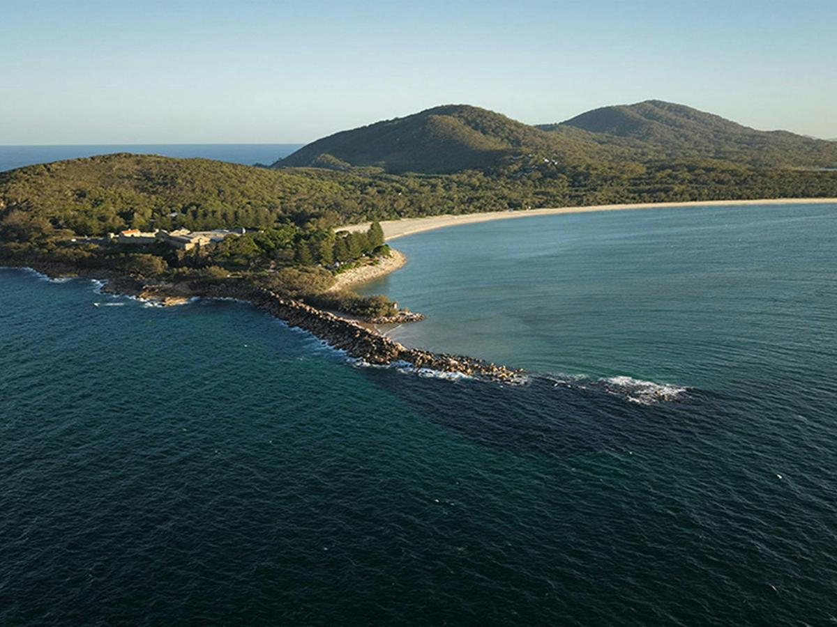 Aerial view of the headland and ocean at Trial Bay in Arakoon National Park. Credit: Glen Ellis