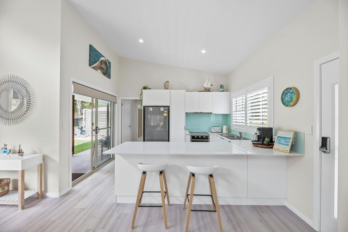 Modern kitchen featuring all new appliances