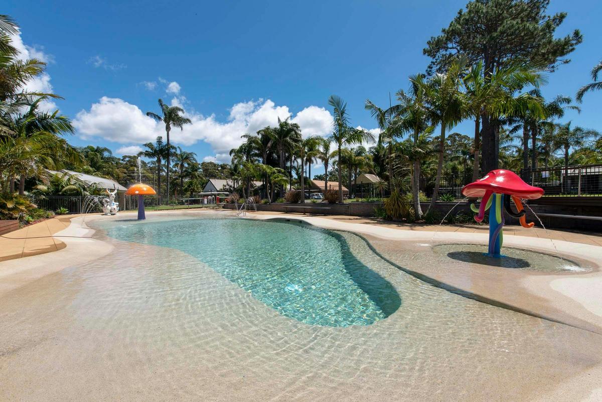 Cool off, slow down and enjoy poolside days at Wairo Beach Holiday Park.