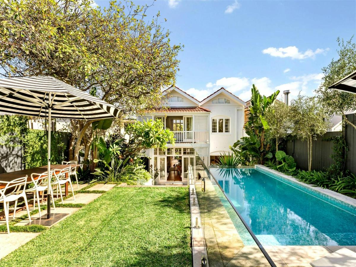 home filled with natural light, stunning interiors and a private garden oasis