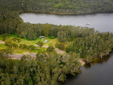 Aerial view of Violet Hill campground and picnic area with surrounding bushland and waterways in