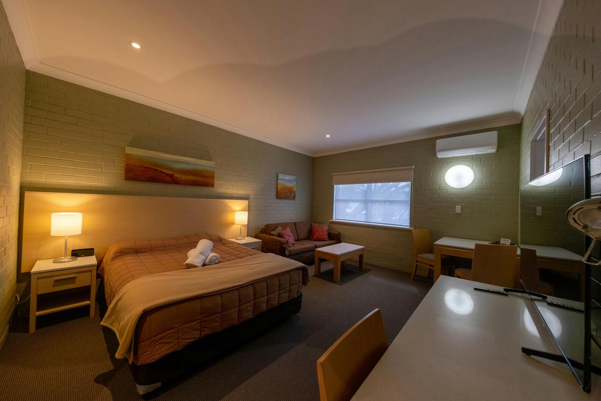 Family Room with a Queen bed, a foldout & 2 singles