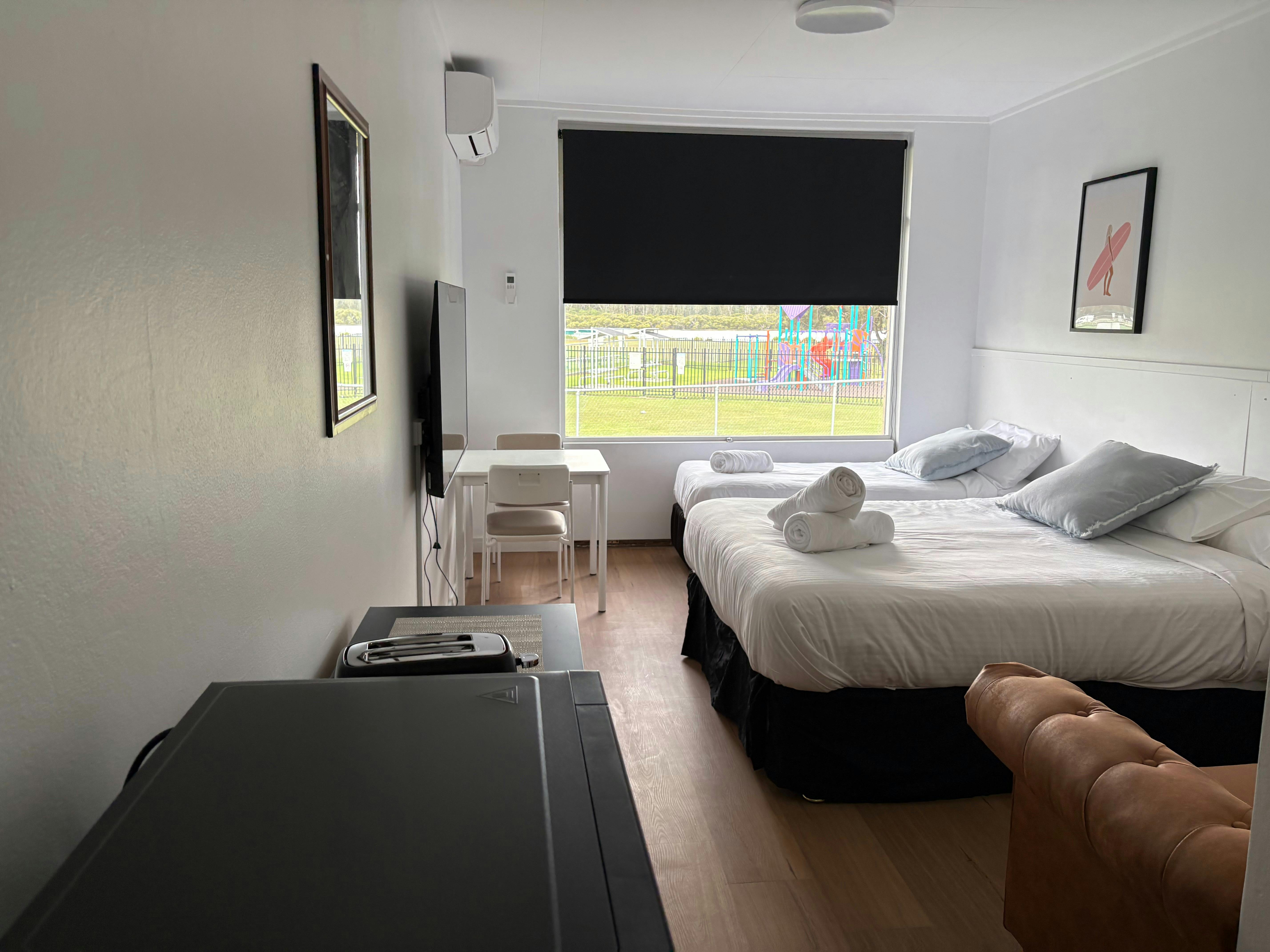 Twin Queen Room- Queen and Single Bed