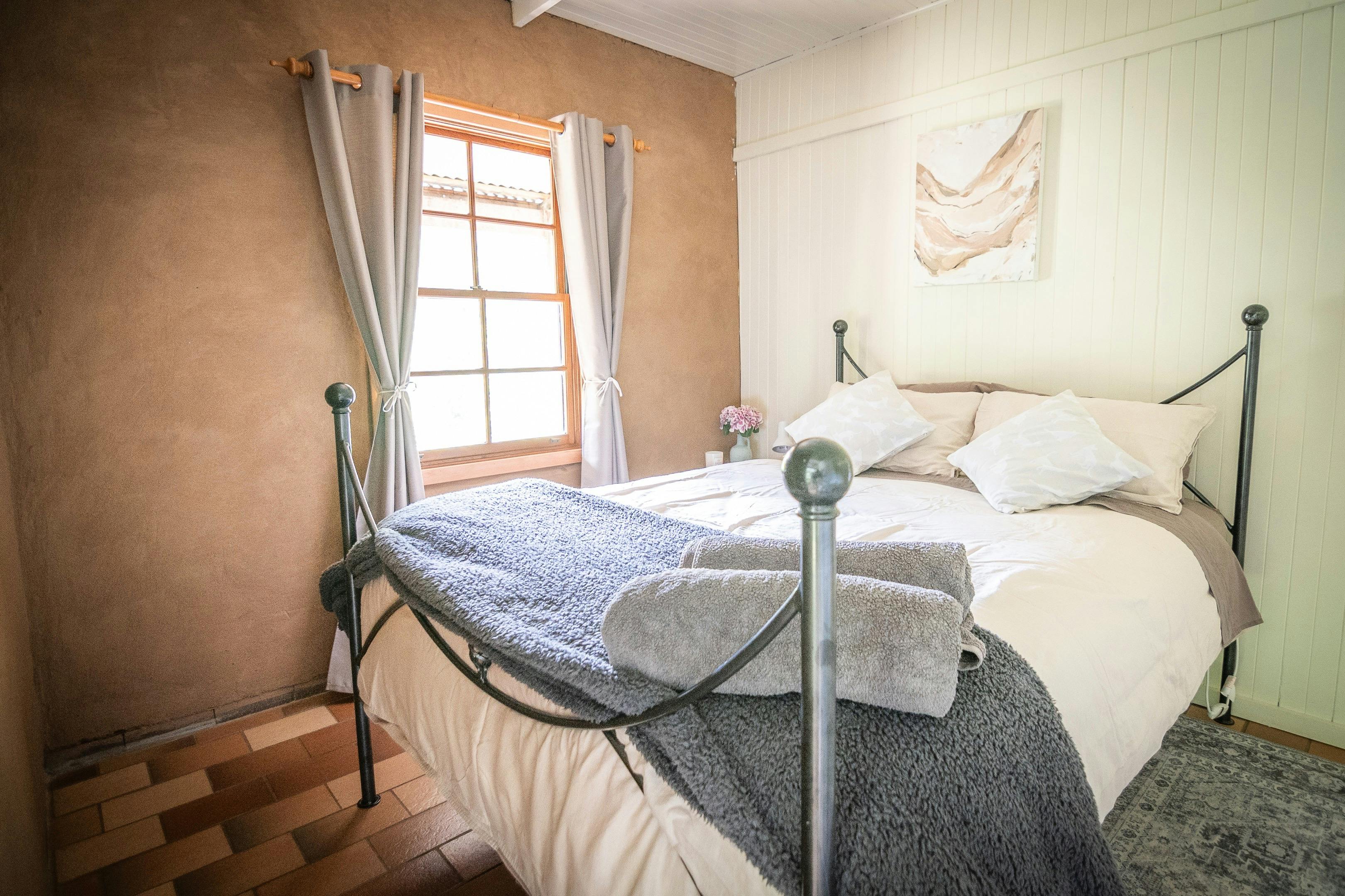 Views down the valley from this comfy queen bedroom
