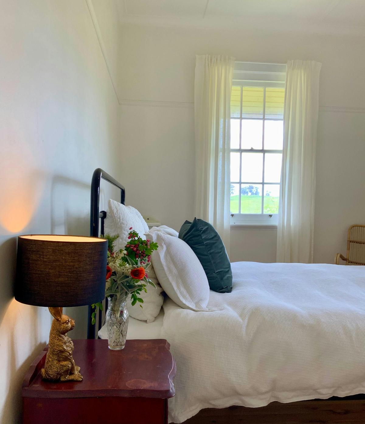 Watch the sunrise over the shearing shed from bed in the second of four bedrooms.
