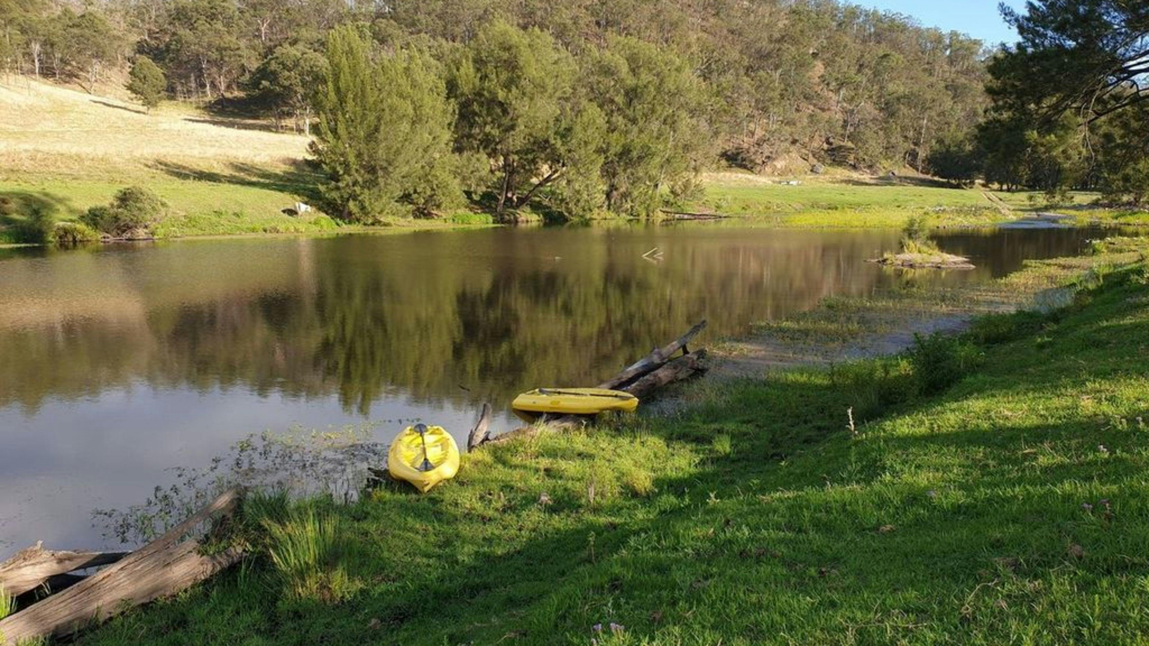 Looking back from Possum Hollow campsite to the causeway, morning time. Our kayaks in the river ready to go.