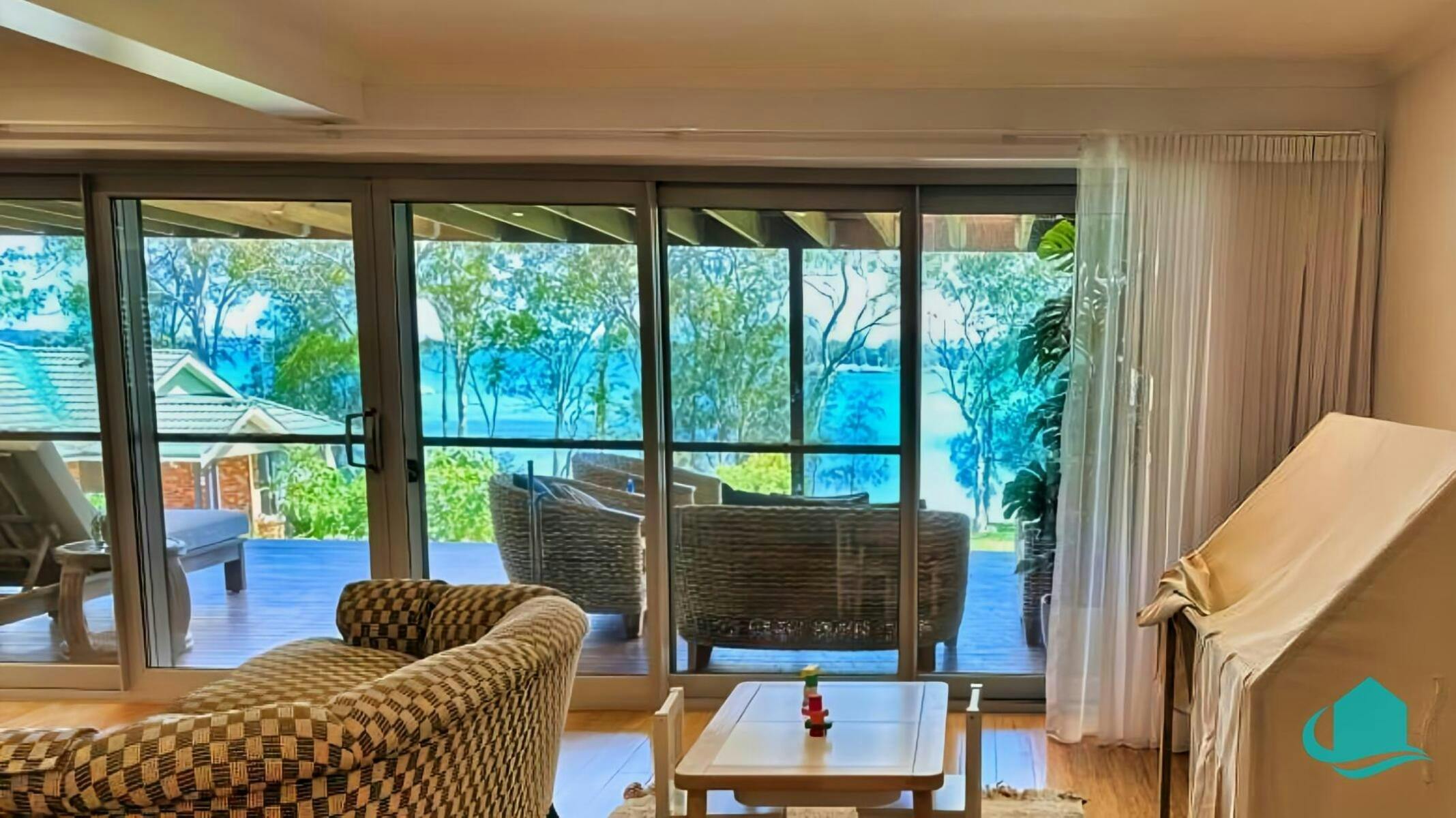 Lounge room with deck leading off it