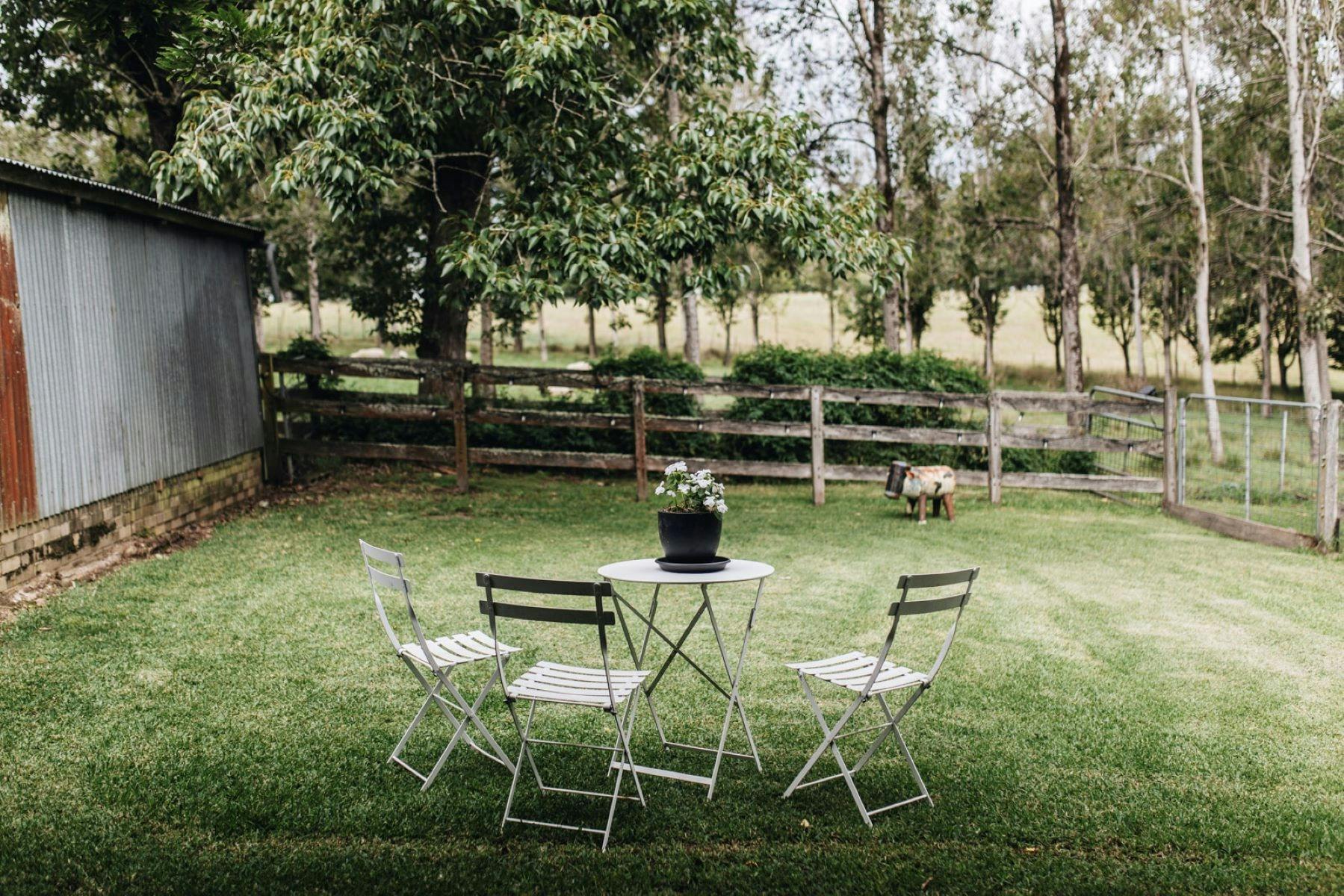 The private fenced backyard is perfect for morning coffee, paddock gazing and small dogs