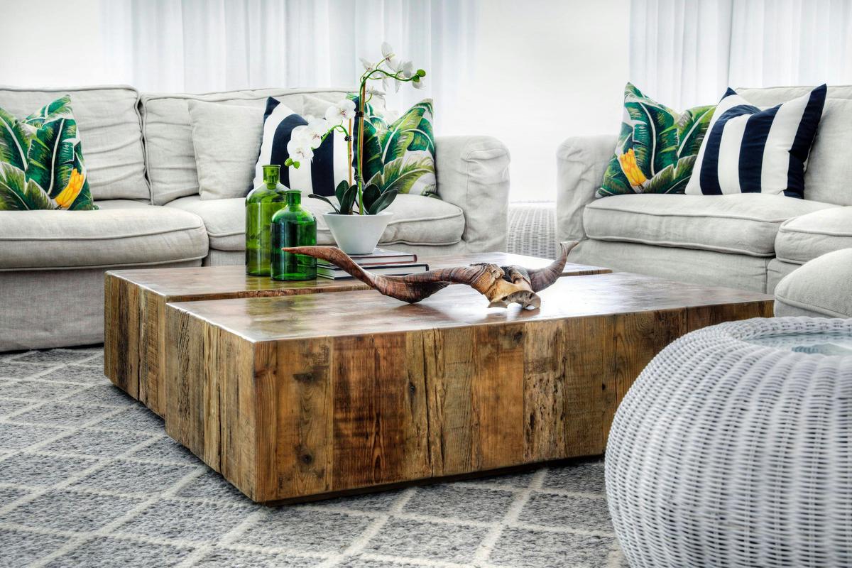 Beautiful family room with contemporary touches and feather filled sofas.