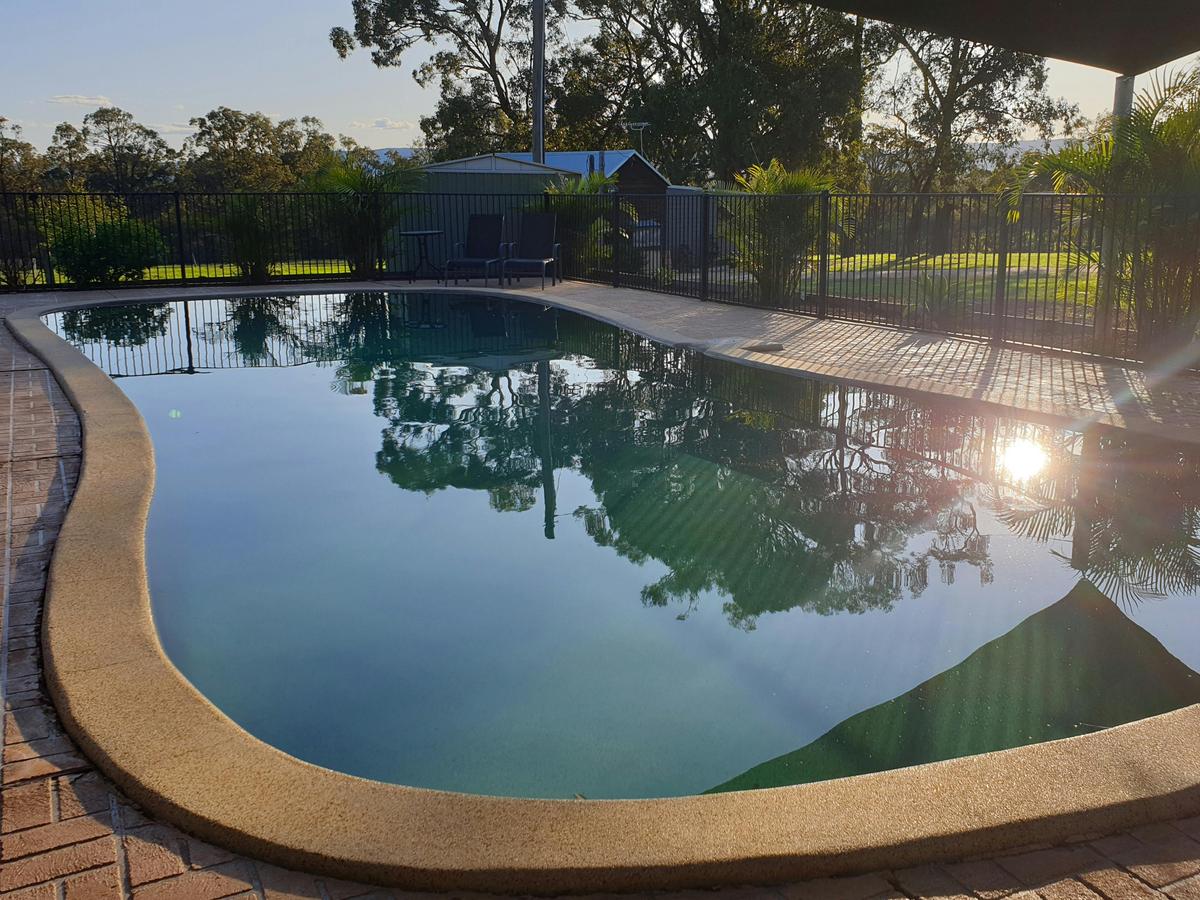 Swimming pool at sunset