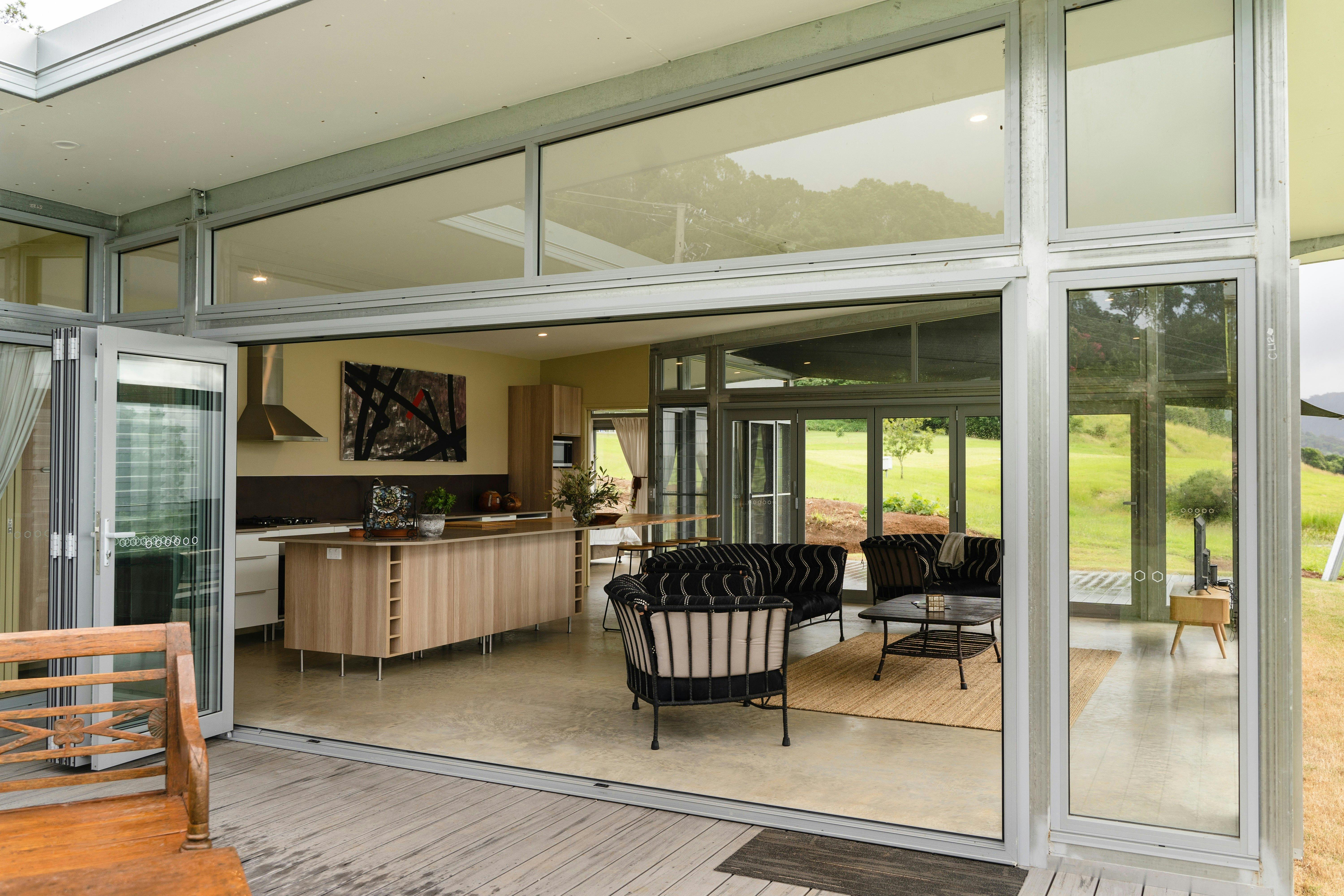 Relaxed living and dining at Origin House Carool in the Tweed Hinterland